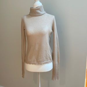 Intermix private label turtleneck sweater with distressed hem and cuffs